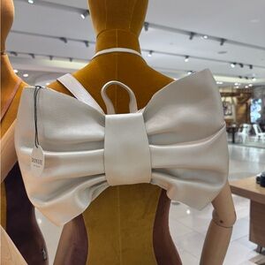 Donsje Iono Bow Off White Metallic Leather backpack